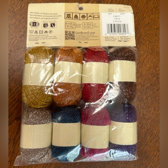 Package of eight Bonbons by Lionbrand. Party color. 8 x .35oz or 38yd each spool - Picture 2 of 3